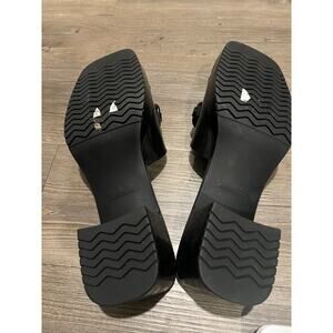 BP black heels with chain detail